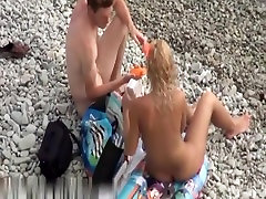 Super hot blonde splashes of love on the beach