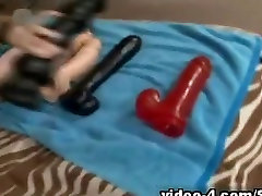 Sexy woman masturbates with sex toy in kinky porn video