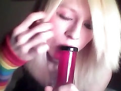 Platinum blonde emo tgirl does a bit of softcore posing