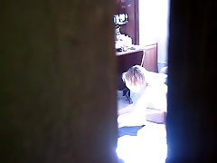 My spy cam peeks at the topless girl ironing her clothes