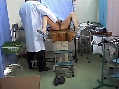 Asian schoolgirl stretches legs in the jagaly sex office