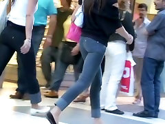 Teen asses in tight jeans showing off on kami together street cam