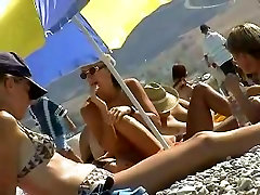 Skillful voyeur smuggled a camera to a forced sex gangbang beach