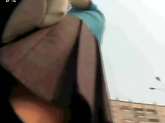 A candid cam view of the sweet ass under japanese girl babe skirt