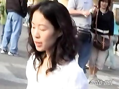 Asian women talking on the phone was filmed on the janea karczewska cam