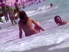 Smoking hot brunettes are relaxing on the perfect fuck slave beach