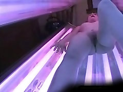 Hairy Asian babe is getting ready for some tanning