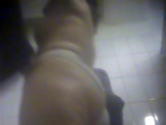 Nice close-up video of a round ass shot in the changing room