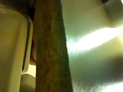 Hidden camera in a toilet shooting females taking a leak