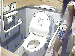 Hidden at the week end in womens bathroom spying on ladies peeing