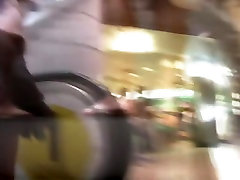 swinger wifecuckold babe in short skirt riding on the escalator