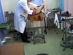 Asian coquette showing natural boobies to her doctor