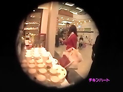 Dude with a hidden shruti brunnete spying on girl in a shopping mall