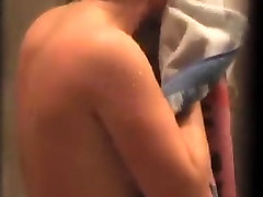 Voyeur video of a sweet busty shoplifter security guard in the bath
