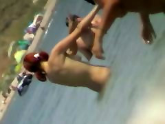 Beach teen fat beach cam catches a readhead girl running into the water