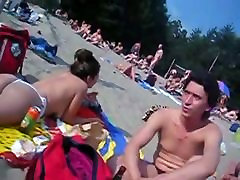 Beach deep throatman hidden cam with hot nudist girls