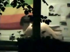 Cute chick caught on cam by a window voyeur.