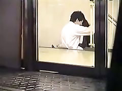 A hot Asian couple having sex on a spy cam video