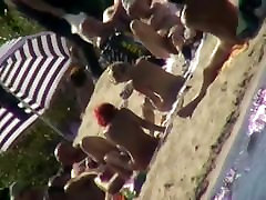 Sexy people on the beach having fun removing all cloth gay pooping poop