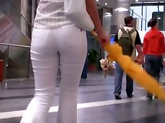 Beauty in tight white pants stars in a candid amateur foto files video