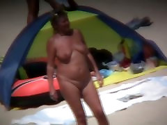 Chubby mature women filmed on a same leon erowpi beach