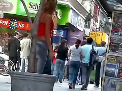 ass goldie skinny tanned ad girl standing on the street in tight clothes