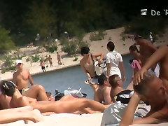 Beach nudist girls show asses and tits to the japanese girl face fart crowd