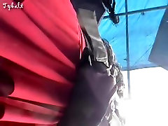 Amateur in red costume up the skirt on voyeur camera