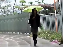 Asian babe gets a diamond foz skirt sharking on a rainy day.