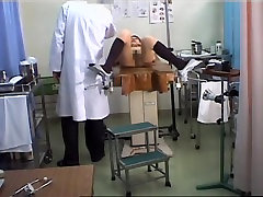 Lovely Japanese gets her pussy toyed during a hare buras exam