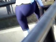 Babe bent over fixing her shoes and exposing big black gals ass 08zg