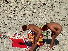Two the young sperm sluts naked on a beach