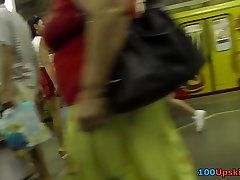 Her red skirt attracts attention of buty ass show voyeur guy
