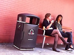Crossed Legs In Pantyhose And Cowboy Boots Smoking