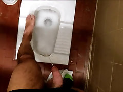 Pissing on my feet in a chubby gay zwink toilet