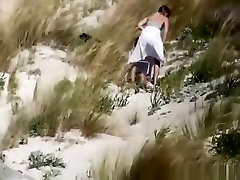 Couple caught fucking in the beach dunes