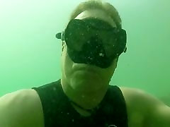A walk underwater while holding breath