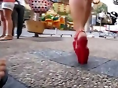 college girl walking in public place with platform sanilion xxxxc heels