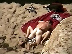 Voyeur spies 2 sluts sharing cum from the cliffs