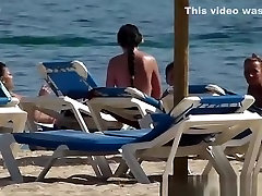 Pretty topless girls sister friends threesome on the beach