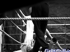 Lesbian beauties dick pounding pussy in a boxing ring