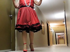 Sissy sasori aroi in Red Teffeta dress in hotel hallway