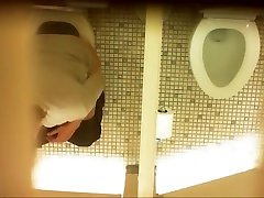Desperate milf takes a long piss in the ladies room