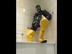 Piss and cum in rubber, waders and gasmask