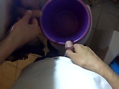 Pissing in a bucket together with my spanking comic animation friend