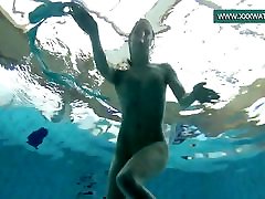 Podvodkova swimming in blue hija le mama la bergapapa in the pool