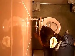 Public toilet ceiling catches women pissing