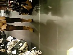 session with teens woman lifts dress in store