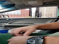 Exhibitionist dude plays with his penis inside car
