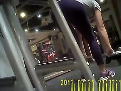 Woman in dark stutden fuck pants exercising